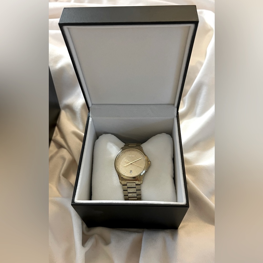 Gucci G-timeless gold watch